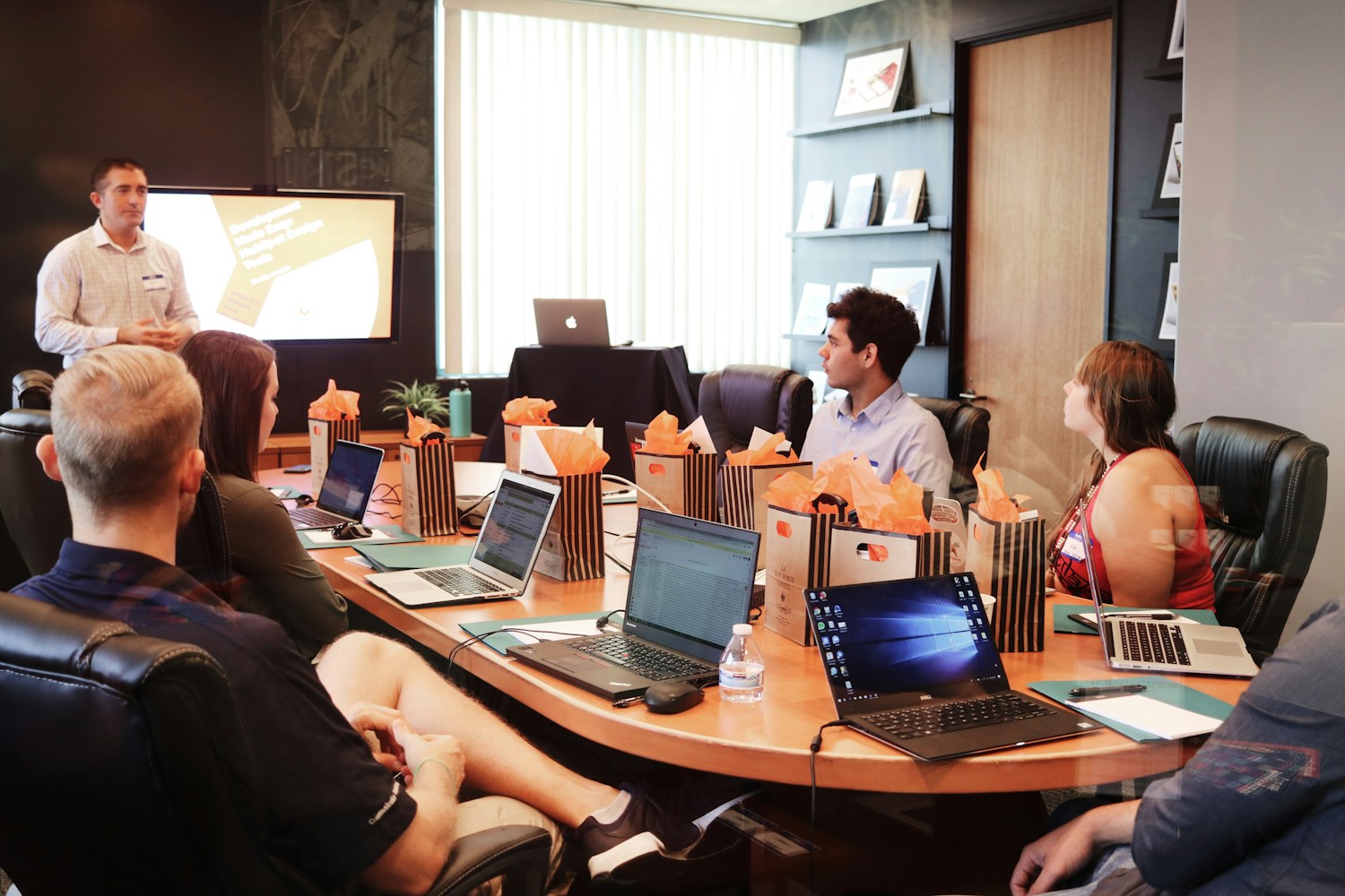 Team developing a brand strategy on a presentation board